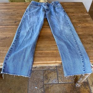 Levi's Blue Jeans with rough cuts on bottom